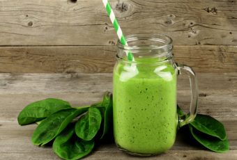 Healthy Green Smoothie With Spinach In A Jar Mug On Wood
