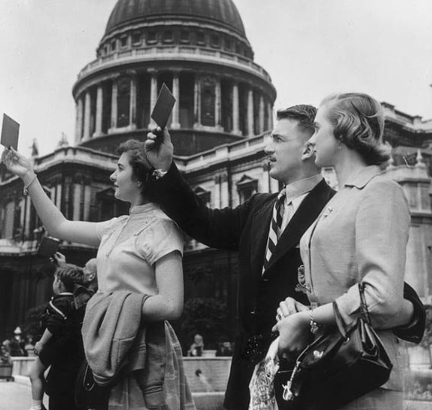 A Stylish Group Of Londoners Watching A Partial Solar Eclipse Back In 1954.