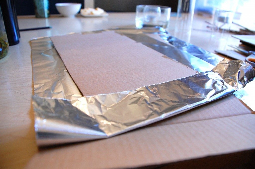 Cardboard Sitting On Aluminum Foil