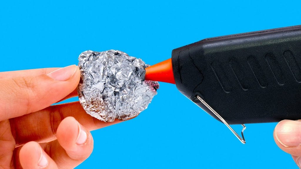 Ball Of Aluminum Foil Cleaning A Glue Gun