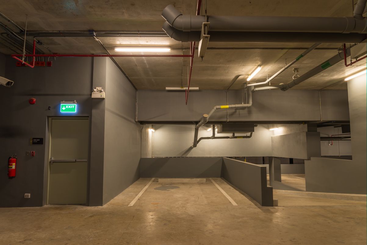 Up And Down Way In Parking Garage Interior Warm Lights In Dark