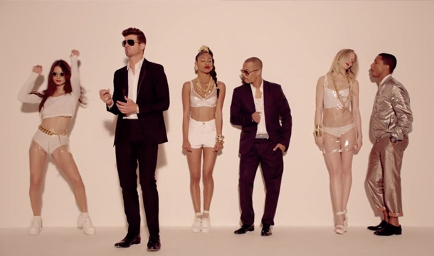 Robin Thicke Feat. TI & Pharrell Blurred Lines