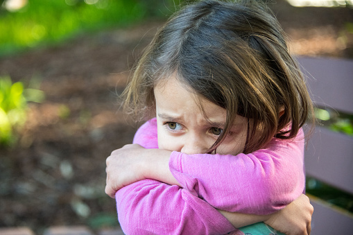 Sad Little Girl Looking Down